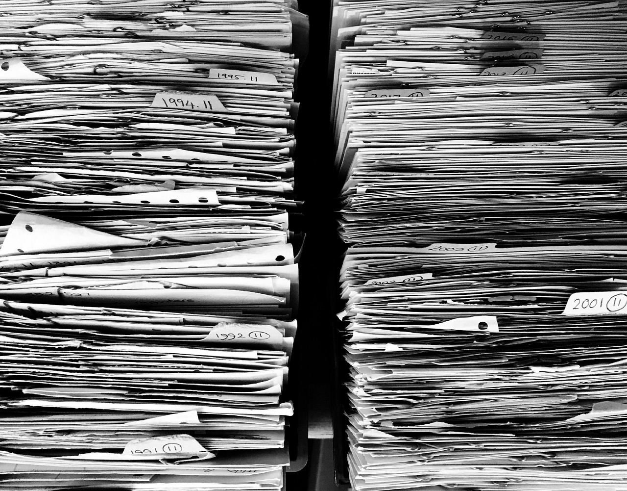 Files, paper, office — Discover the Comprehensive Benefits of Ledger Live for Crypto