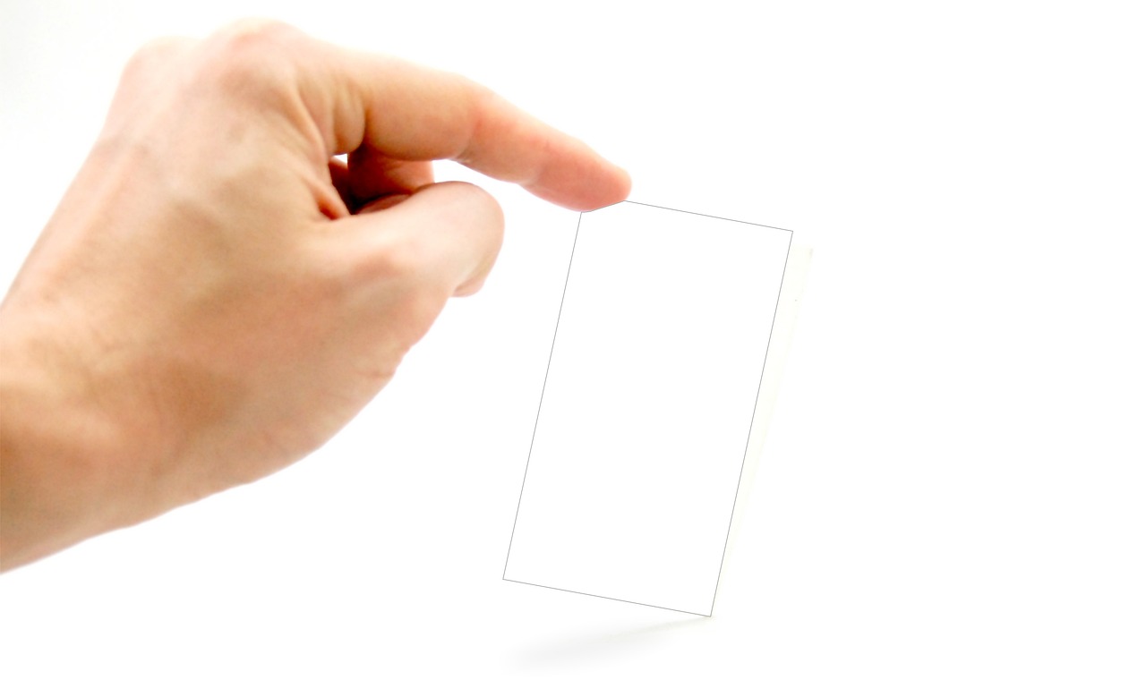 Business card, business, hand — IronFX Withdrawal Fees: Enjoy Transparent and Trader-Friendly Transactions